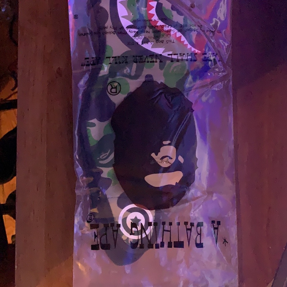 Brand new never open bape mask.